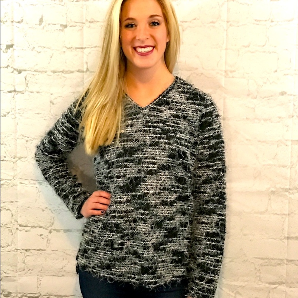 Furry black and white V-neck sweater. Brand new from my boutique.